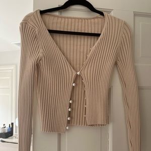 Verge girl cardigan with pearl details. One is missing but barely noticeable on.
